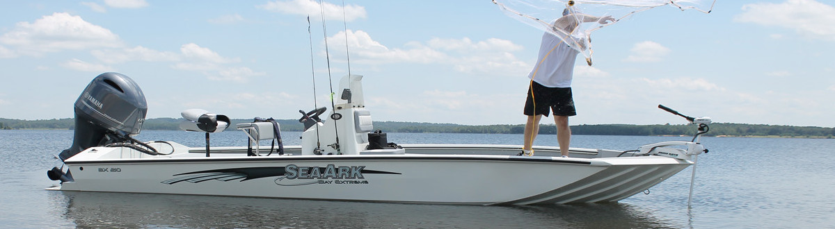 2017 a man fishing in his SeaArk Outboard at sea.